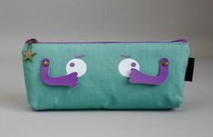 How cute are these pencil pouches for back to school? This would make the perfect back to school or new job gift. Great for both boys and girls. It could also be used as a make up bag or sewing kit.These  pencil cases make the perfect pouch for all ages! Its unique design and style caters to all personalities. Simply fill with pens, pencils, stationery or even travel essentials! This piece will arrive to you in retail packaging! Cute Stationery For Back To School Organization, Cute Pencil Case For Back To School Organization, Cute Zipper Pouch Stationery For School, Cute School Stationery Pouch, Green Pencil Case For Back To School, Novelty Pencil Case With Pen Holders For School, Novelty School Pencil Case With Pen Holders, Green Zipper Pouch Stationery For School, Green Pencil Case With Pen Slots For School