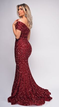 Sequin bodice Back zipper closure Off shoulder Model wearing size Small Red Fitted Evening Dress With Asymmetrical Neckline, One-shoulder Fitted Evening Dress For Red Carpet, Fitted One-shoulder Evening Dress For Red Carpet, Red One Shoulder Gown For Prom, Red One-shoulder Gown For Prom, Red Fitted One-shoulder Dress, Red Off-shoulder Evening Dress With Fitted Bodice, Red Fitted One-shoulder Gown, Gold Sequin Gown