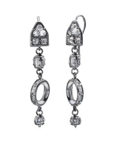 Ethereal and light-filled, the Castle earrings in energetic white topaz and sterling silver embody sleek geometry and a refreshingly genuine optimism. Sterling silverWhite topazHook fixtureBlack rhodium finishWidth: 5/16" (8 mm)Depth: 1/2" (12.5 mm)Height: 1-15/16" (50 mm) Sterling Silver Earrings With Single Cut Diamonds For Evening, Sterling Silver Single Cut Diamond Earrings For Evening, Silver Platinum Dangle Earrings, Modern Formal Platinum Earrings, Silver Earrings With Single Cut Diamonds For Evening, Classic Silver White Topaz Earrings, Classic Silver Earrings With White Topaz, Silver White Topaz Drop Earrings, Modern Silver Crystal Earrings For Evening