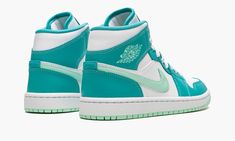 The Women’s Air Jordan 1 Mid “Washed Teal” is a fun and vibrant take on the iconic basketball sneaker.  This shoe features an all-leather makeup, starting off with a white underlay and two tones of green, Washed Teal and Mint Foam, across the upper.  Rounding out this sneaker is a white-on-white tongue and lace combo, and a white midsole paired with a Mint Foam rubber outsole. Teal Jordans, Womens Air Jordan 1, Womens Air Jordan, Teal Shoes, Trendy Shoes Sneakers, Preppy Shoes, All Nike Shoes, Womens Air Jordans, Cute Nike Shoes