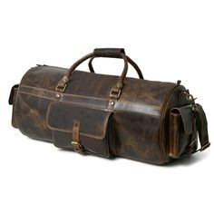 a large brown leather duffel bag on a white background