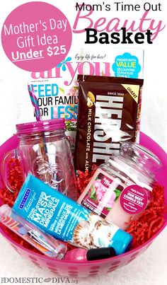 a pink bowl filled with items on top of a table