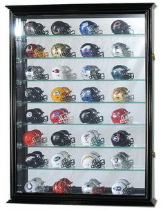 a display case with football helmets in it