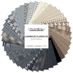 an assortment of fabric samples in various colors and patterns, including grays, beiges, browns