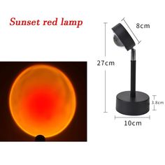 the sunet red light is shown in front of a black stand with measurements for it