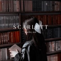 a woman standing in front of a book shelf with books on it and the words scarielt