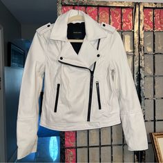 Marciano Motorcycle Jacket White W/ Black Zippers - Nwt - Size Xs - Luxury Lambs Leather - Fully Lined - Gorgeous Piece - Payed $398 - See Pics For Approximate Size - Let Me Know If You Have Any Questions Genuine Leather, Leather, Leather Jacket, Lamb Leather, Moto, Motorcycle, Biker, Biker Chic, Contemporary, Casual, High End, Luxury, White & Black, Daytime, Nighttime, Party, Fall, Winter, Spring, Real Leather White Outerwear With Zip Fly For Fall, White Moto Outerwear With Long Sleeves, White Long Sleeve Moto Outerwear, White Fitted Moto Outerwear, White Moto Leather Jacket For Fall, White Moto Outerwear With Zipper Closure, White Moto Leather Jacket With Zipper Closure, White Moto Biker Jacket With Zipper, White Zipper Closure Outerwear For Work