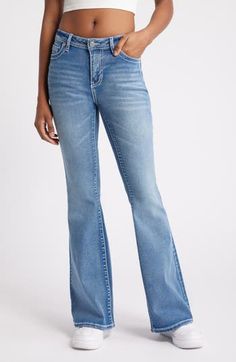 Designed with contrast topstitching and a sanded finish, these stretch-kissed flare jeans exude retro style wherever you go. 33" inseam; 23" leg opening; 9" front rise; 14 1/2" back rise (size 27) Zip fly with button closure Five-pocket style 69% cotton, 26% polyester, 3% viscose, 2% spandex Machine wash, tumble dry Imported Fitted Flare Jeans With Contrast Stitching, Fitted Dark Wash Flare Jeans With Contrast Stitching, Trendy Mid-rise Flare Jeans With Contrast Stitching, Mid-rise Flare Jeans With Contrast Stitching In Medium Wash, Casual Fitted Flare Jeans With Contrast Stitching, Dark Wash Mid-rise Flare Jeans With Contrast Stitching, Mid-rise Flare Jeans With Contrast Stitching In Dark Wash, Spring Flare Jeans With Contrast Stitching In Medium Wash, Mid-rise Dark Wash Flare Jeans With Contrast Stitching