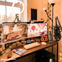 a computer monitor sitting on top of a wooden desk