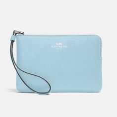 Crossgrain Leather Two Credit Card Slots Zip-Top Closure, Fabric Lining Wrist Strap Attached 6 1/4" (L) X 4" (H) X 1/2" (W) Style No. 58032 Elegant Rectangular Wristlet For Spring, Elegant Spring Wristlet For Everyday, Elegant Rectangular Spring Wristlet, Elegant Spring Rectangular Wristlet, Coach Blue Wristlet For Travel, Everyday Blue Pouch Wristlet, Elegant Blue Coach Wallet, Blue Rectangular Clutch For Spring, Coach Blue Clutch For Everyday Use