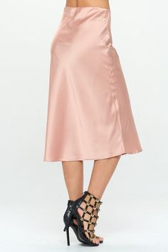 Made in USA Solid Stretch Satin Midi Skirt. Fabric content: 97% Polyester, 3% Spandex. Available in other Colors. Style: casual, formal, work Print / Pattern: solid Silhouette: pencil skirt Fit: fit Length: knee-length Lining: no Made In: Made in U.S.ASize Measurement (inch): S: 13.5 (Waist), 18.5 (Hips), 29.3 (Length) M: 14.5 (Waist), 19.5 (Hips), 29.8 (Length) L: 15.5 (Waist), 20.5 (Hips), 30.3 (Length) Elegant Pink Satin Bottoms, Pink Stretch Pencil Skirt For Party, Elegant Pink Pencil Skirt For Parties, Feminine Satin Bottoms, Feminine Party Pencil Mini Skirt, Feminine Lined Pencil Skirt For Party, Feminine Knee-length Party Skirt, Feminine Fitted Satin Bottoms, Spring Evening Mini Pencil Skirt