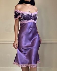 - Elegant purple knee-length slip dress featuring a lace-trimmed bodice with cap sleeves and a smooth satin skirt - Scooped neckline with a heart-shaped lace overlay; dainty lace edging along the sleeves and hem - Size M - pit to pit: 16" across - waist: 15" across - Excellent condition with no visible damage or wear signs Model Measurements: - Bust: 34B - Waist: 26 - Hip: 38 - Height: 5"4  Size of mannequin: size 2 - 4 Satin Midi Length Dresses With Lace Trim, Fitted Silk Dress With Contrast Lace, Party Slip Dress With Lace Patchwork, Party Slip Dress With Lace Trim And Fitted Bodice, Fitted Satin Slip Dress In Coquette Style, Fitted Satin Slip Dress With Lace Bodice, Silk Day Dresses With Contrast Lace, Silk Dresses With Contrast Lace For Daywear, Fitted Silk Slip Dress With Lace Trim