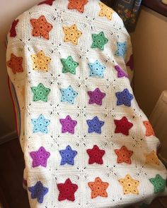 a crocheted blanket with stars on it