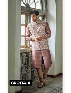 FEATURES:- The Bundi Set comprises a sleeveless jacket also called Nehru jacket, paired with a Kurta (long tunic) and either Pyjama (loose-fitting pants) or Trouser for a complete ensemble. To style it, pair the Bundi and Kurta with the Pyjama for a traditional ethnic look or opt for a more contemporary appearance by combining them with the Trouser for a modern twist that retains its cultural essence. Experiment with accessories like a statement pocket square or ethnic footwear to elevate the ensemble further.  Dark peach color kurta & heavy jekard printed cotty you can pair it with golden chudidar in bottom.  INCLUDE:- (i) jacket/bundi   (ii) kurta (top) inner cotton (middle cut pattern) (iii) pant/chudidar (bottom) QUALITY:- Heavy Gsm Raw-silk used in kurta ,heavy jekard printed jacket a Garden Party Outfit Men, Men Street Styles, Casual Wedding Outfit, Indian Wedding Clothes For Men, Nehru Jacket For Men, Waistcoat Designs, Garden Party Outfit, Wedding Kurta For Men, Party Outfit Men