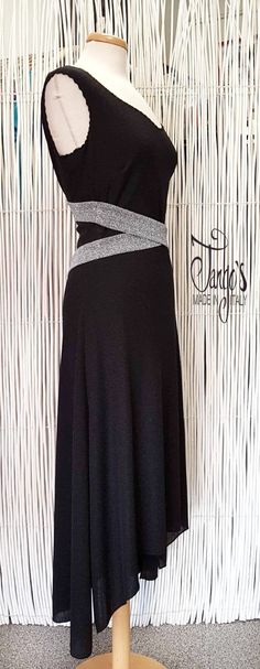 "Dress made in particular black stretch maglina, with silver application in bright lurex fabric. Side and rear slits. Ability to make it in other colors. Contact us for information. www.tango-s.com - info [!at] tango-s.com TANGO'S offers you exclusive and original models, garments of refined and unique elegance, tailoring carefully curated in every detail, made in a rigorous \"Made in Italy\" combining Quality, Passion, Elegance and Comfort. Estimated delivery times 10 days Express shipment 1-2 Black Stretch Evening Dress For Gala, Black Stretch Gala Evening Dress, Silver Stretch Evening Dress, Black Silver Dress, Tango Outfit, Lurex Fabric, Black And Silver Dress, Tango Dress, Bright Fabrics