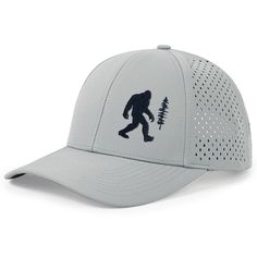 a grey hat with a bigfoot on the front and a tree on the back