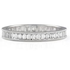 a white gold band with baguetts and diamonds