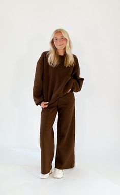 + rich chocolate brown color+ super soft & cozy set+ comfortable elastic waistline at pants with straight leg+ relaxed & luxe pullover sweatshirt set includes both top & bottom Top Size Small: Bust 20.5'' // Waist 23'' // Length 24'' // Hips 20'' // Size Medium: Bust 22.5'' // Waist 25'' // Length 26'' // Hips 22'' // Size Large: Bust 25'' // Waist 27'' // Length 28'' // Hips 24'' // Bottoms Size Small: Bust 30'' // Waist 26'' // Length 38'' // Hips 42'' // Size Medium: Bust 32'' // Waist 28'' / Fall Loungewear Relaxed Fit Sweatpants, Fall Relaxed Fit Sweatpants For Loungewear, Relaxed Fit Sweatpants For Fall Loungewear, Brown Relaxed Fit Sweatpants For Winter, Winter Brown Relaxed Fit Sweatpants, Oversized Sweatpants With Elastic Waistband For Fall, Brown Sweatshirt With Ribbed Cuffs For Loungewear, Brown Winter Sweatpants For Loungewear, Comfortable Fall Sweats With Straight Hem