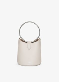 Chic Bucket Bag With Silver-tone Hardware And Double Handle, Luxury Shoulder Bag With Silver-tone Hardware And Round Handle, Shoulder Bag With Silver-tone Hardware And Round Handle, Chic Shopping Bucket Bag With Silver-tone Hardware, Chic Bucket Bag With Silver-tone Hardware For Shopping, Shopping Bucket Bag With Silver-tone Hardware, Formal Bucket Bag With Detachable Double Handle, Timeless Bucket Bag With Detachable Handle, Timeless Bucket Bag Tote With Detachable Handle