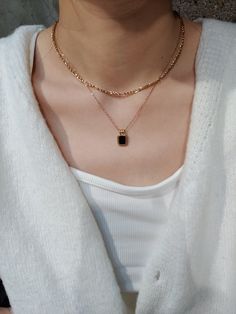 Black Stone Necklace, black onyx necklace with gold chain choker: two layers necklaces look. Gold layering necklaces are an easy chic style for you. Ideal gift for her, for your mum, or a gift for your friends. ♥ SIGN UP for 10% OFF your first order: https://bit.ly/3olIlWf ♥ DETAILS - Materials: Stainless steel, 18k gold plating. - Nickel-free, anti-corrosion, tarnish-resistant, and hypoallergenic. - Safe for sensitive skin. - Waterproof Necklace: you can wear it while taking a shower or swimmin Layering Chain Necklace, Gold Black Necklace, Gold And Black Necklace, Trendy Jewelry With Adjustable Rectangular Chain, Trendy Rectangular Jewelry With Adjustable Chain, Trendy Black Jewelry With Double Chain, Modern Black Jewelry With Double Chain, Trendy Black Double Chain Jewelry, Elegant Black Jewelry With Rectangular Links