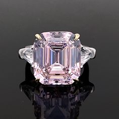 Personally Designed MEGA pink topaz ring in emerald cut, set with two white topaz side gemstones in fine (solid) British sterling silver that is polished to perfection. It has a bright finish and it doesn't tarnish. 💎 Gem Stone: Natural Pink Topaz 14*16mm 💎 Gemstone Shape: Octagon with Emerald Cut 💎 Material: Sterling Silver version is in stock for immediate dispatch, but all gold and platinum versions are made to order, taking approximately 4 weeks for me to complete. 💎 Band Size - please m Pink Topaz Ring, Pink Topaz, Luxury Rings, Pink Gemstones, Pink Quartz, Pink Diamond, Topaz Ring, Cocktail Ring, Jewelry Pouch