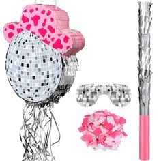 pink and silver party decorations including disco balls