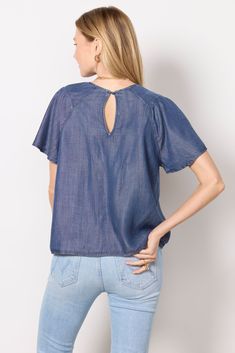 Short flutter sleeves add effortless style to the Alice top by EVEREVE. Crafted in soft chambray fabric, this relaxed silhouette features seamed shoulders and a back keyhole button closure. Tuck into white cutoffs, or pair with blue jeans for a chic all-denim look. | EVEREVE Women's Alice Chambray Flutter Top, Size XL, Blue Chambray Fabric, Brand Style Guide, Fashion 101, Fall Shopping, Tee Dress, Flutter Sleeves, Work Fashion, Fall Trends, Medium Blue