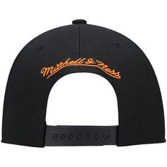 Material: 100% Polyester High Crown Flat bill Snapback Embroidered graphics Contrast-color underbill Embroidered fabric applique One size fits most Six panels with eyelets Dry clean only Officially licensed Imported Brand: Mitchell & Ness Adjustable Black Baseball Cap With Embroidered Logo, Black Adjustable Fitted Hat With Embroidered Logo, Adjustable Black Fitted Hat With Embroidered Logo, Adjustable Cotton Trucker Hat For College, Collegiate Adjustable Trucker Hat With Embroidered Logo, Adjustable Sports Hats With Embroidered Logo, College Snapback Hat With Embroidered Logo And Curved Bill, Black Cotton Snapback Hat With Letter Print, Sports Cotton Hat With Logo