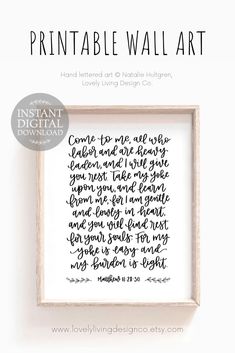 the printable wall art is displayed in a wooden frame with black ink on it