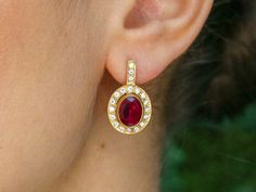 Vintage Ruby Earrings set with Created Ruby in a flawless clarity & stunning red color, at 10x8mm each (6 Cts a pair). Surrounded by CZ Diamonds. Gold Vermeil: 18k Gold over Solid 925 Sterling Silver ☞ made to last. Click here for ☞ Matching RingClick here for ☞ Matching Pendant Details:• Created Ruby in a flawless clarity • Emerald: 10x8mm each, 3 Cts a pair, diamond cut• Lever Back Closure - "English Lock"• Dimensions: Length 25mm, Width 14mm• 18k Gold Vermeil SKU 2268 Elegant Ruby Earrings With Stone Setting, Gold Ruby Earrings With Stone Setting, Gold Ruby Gemstone Earrings, Classic Ruby Earrings In Yellow Gold, Luxury Gold Ruby Earrings, Gold Ruby Earrings, Ruby Earrings Studs, Birthstone Earrings, Ruby Earrings