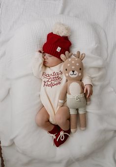 Santa's cutest little helper just got cuter with this soft bubble romper! This buttery soft, cream-colored, one-piece is made from 100% organic cotton for the ultimate comfort. With holly red embroidery that says "Santa's Little Helper," your baby will look absolutely festive this holiday season. Now bring on the gifts! Santa's Little Helper Romper matches our Luna + Luca Pom Beanie in Holly and the Luna + Luca Organic Booties in Holly 100% Organic Cotton Features: Snap closure at inseam Snap cl Girls Wedding Shoes, Communion Shoes, First Communion Shoes, Diaper Bag Accessories, French Baby, Maternity Pajamas, Newborn Christmas, Baby Basics, Santa's Little Helper