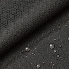 black fabric with water droplets on the bottom and side, as well as an image of bubbles