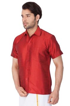 Vastramay brings to you this Stylish yet Comfortable Men Maroon Ethnic South Indian Shirt. Adorn it for a perfect Classy and Trendy look. These Shirts are usually very popular in Souther part of the Sub Continent. These are also called Madras Shirt. It is worn along with a trouser or a jeans. However, traditionally it is paired with a mundu or a white dhoti. The set is also called as Shirt Vesty. Product Features :   Top Color: Maroon Top Fabric: Cotton Art Silk Product Type: Ethnic South Indian Short Sleeve Kurta For Eid Festive Occasion, Short Sleeve Tops For Eid Festivities, Festive Short Sleeve Tops For Eid, Traditional Festive Short Sleeve Shirt, Traditional Short Sleeve Festive Shirt, Traditional Short Sleeve Tops For Eid, Festive Cotton Short Sleeve Shirt, Festive Short Sleeve Cotton Shirt, Festive Kurta For Navratri With Short Sleeves