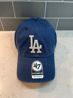 Timber Blue LA Dodgers '47 Brand Clean-Up hat that is hand-blinged with White Opal Swarovski Crystals by me. * Relaxed Fit, Garment Washed * Self Fabric Strap for a OSFA * Cotton Twill ✨ I meticulously hand-bling each hat✨ Dodger Hat, Bling Hat, Stl Cardinals, Red Tie, Fabric Strap, 47 Brand, Austrian Crystal, White Opal, Trucker Cap