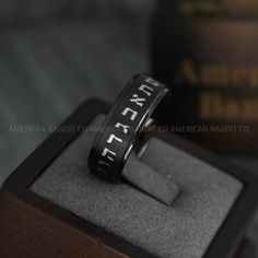 IMG_4450 Black Engraved Ring For Promise, Black Elegant Engraved Promise Ring, Black Engraved Promise Ring, Black Adjustable Engraved Promise Ring, Black Symbolic Jewelry For Promise, Adjustable Black Engraved Ring, Customizable Black Promise Jewelry, Elegant Black Wedding Bands, Black Round Band Jewelry For Wedding