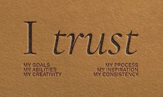 the word trust written in black ink on a brown paper