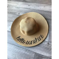 Enjoy Free Shipping on these hats! All of my hats are now bigger & better! Diameter of the entire hat is 19" and the brim is 5.5". Beige, white, and black are all available. This large floppy hat is perfect for the perfect summer trip or day at the beach! This can say anything you want for no additional cost! This is personalized with high quality heat-transfer vinyl. Trendy Flat Brim Hat For Beach Season, Fun Brimmed Hats For Beach Season, Fun Brimmed Beach Hat, White Letter Print Hat For Vacation, Fun Flat Brim Bucket Hat For The Beach, White Letter Print Vacation Hat, Summer Beach Hats With Letter Print, Trendy Beach Sun Hat With Letter Print, Summer Beach Hat With Letter Print