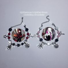 two necklaces with pictures of spider - man and catwoman hanging from the sides