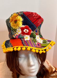 This hat is made sustainably, it is crafted from some vintage clothing and table linens.   The hat is patchwork and it is embellished with an appliqué on the front. Great costume piece or just to wear at that next festival. the hat measures 21 inches Sea Character, Bohemian Hat, Top Hat Costume, Patchwork Bucket Hat, Rave Hats, Hippie Hat, Vintage Table Linens, Canvas Hat, Colorful Hat