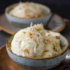 two bowls filled with ice cream on top of a table