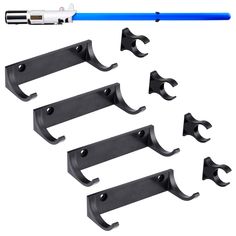 PRICES MAY VARY. Perfect Solution for Lightsaber Display: This horizontal lightsaber wall mounts come with 4 plastic hilt hooks and 4 plastic blade clips which will hold your saber securely and beautifully. Easy to Use: 1. Screw the hook and clip into the wall. 2. Put the hilt into the hook, and slip the blade into the clip. Hardware included. Sturdy: Thick plastic hook supports the weight of lightsaber. Durable plastic clip controls the blade not to fall. The kit is sturdy enough and can last f Lightsaber Wall Mount, Lightsaber Display, Star Wars Nursery, Nerd Cave, Lightsaber Hilt, Star Wars Decor, Wall Mounts, Utility Hooks, Plastic Clips