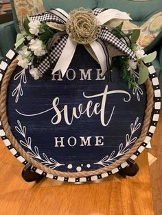 a wooden sign that says home sweet home