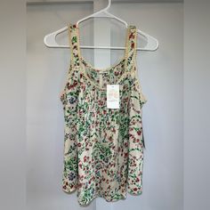 Floral Tank Top Never Worn Yellow Floral Print Tank Top For Spring, Cream Printed Tops For Summer, Summer Yellow Floral Print Tank Top, Yellow Bohemian Tank Top For Spring, Spring Patterned Tank Top, Beige Floral Print Summer Tops, Summer Beige Floral Print Tops, Patterned Tank Top For Spring, Green Floral Print Tank Top For Spring