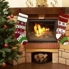 a fireplace with stockings hanging from the mantle