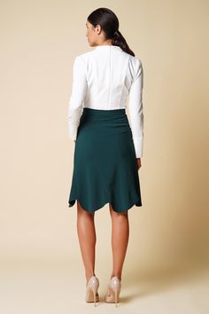 "A green skirt featuring a high-rise styling, midi length, and a trumpet silhouette. - high waist - trumpet silhouette - knee midi length - concealed back zipper closure - godet style Color: dark green Fabric: viscose - 40%, elastane - 5%, polyester - 55%. Our model wears size S (US 6) and is 178 cm / 5'8\" tall. MORE ITEMS: https://www.etsy.com/shop/TAVROVSKA?ref=hdr_shop_menu SIZE CHART XS __ EU 32 __ US 2 bust: 31,5\" | 77 cm waist: 24,5\" | 59 cm hips: 34,5\" | 84 cm XS __ EU 34 __ US 4 bust Fitted Flared Mini Skirt For Office, Green Flowy Midi Skirt, Elegant Green Mini Skirt For Office, Elegant Green Pencil Mini Skirt, Fitted Flared Mini Skirt For Work, Workwear Fitted Flared Mini Skirt, Green Relaxed Midi Skirt, Green Fitted Mini Skirt For Office, Formal Fitted Flared Mini Skirt