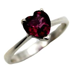 This is part of Chairish’s Fine Jewelry assortment.  This 18k white gold ring features a beautifully coloured heart-shaped garnet. The garnet is a saturated deep magenta, with facets that sparkle in many different hues of pink and red. It is prong set with three prongs; the back of the carriage or underside of the ring is a heart shape as well, for an adorable added touch. A wonderful sweetheart ring , this is the perfect gift to show someone your love or your self love.  The rings weighs 2.9 gr Deep Magenta, Victorian Flowers, Garnet Ring, White Gold Ring, Garnet Rings, Pearl Size, Flower Ring, Gold Heart, Ring Size 7