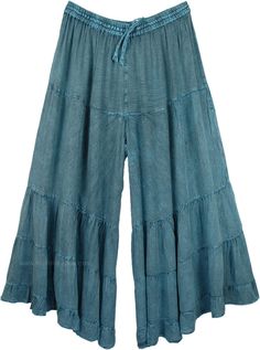 A relaxed pair of long dull stonewashed teal palazzo pants for the summer season. The huge flare gives it a feminine yet cool bohemian look, almost looks like a skirt with divided legs. You can mix and match the styles and wear them with tops of different colors. It has an elastic waistband and drawstrings for extra comfort. These casual summer day pants will go with every style and fashion. You can wear them with flats or heels. You can wear jewelry and accessorize yourself. The fabric is light Summer Bohemian Denim Pants, Bohemian Blue Straight Leg Pants, Indigo Bohemian Relaxed Fit Bottoms, Indigo Full Length Bottoms For Summer, Bohemian Style Light Wash Bottoms For Spring, Bohemian Light Wash Bottoms For Spring, Bohemian Denim Blue Bottoms For Summer, Bohemian Style Blue Denim Pants, Bohemian Blue Denim Pants