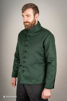 Our 15th-century-style arming doublet is designed to fit into any armor set with ease, providing a secure fit and sturdy anchorage for the legs, arms, and shoulders. Crafted from lightweight yet resilient cotton, it offers superior comfort and protection. • Dyed with natural dyes. For best results, wash by hand with cold water and mild detergent. We also advise turning the garment over to protect the garment’s outer side. • External fabric is made up of 100% cotton • Padding is made of 100% poly Fitted Medieval Outerwear For Fantasy Events, Medieval Outerwear For Larp With Historical Design, Historical Design Outerwear For Medieval Festivals, Elven Outerwear For Medieval Festivals, Medieval Style Outerwear For Larp And Festivals, Medieval Style Outerwear For Larp And Medieval Festivals, Medieval Style Outerwear For Fantasy Events, Black Week, Waist Circumference