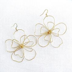 This Dangle & Drop Earrings item by Charisas has 237 favorites from Etsy shoppers. Ships from Billings, MO. Listed on Aug 30, 2024 Flower Statement Earrings, Daisy Jewelry, Magnolia Flower, Flower Motif, Ultra Modern, Wire Earrings, Modern Floral, Jewelry Handmade, Jewelry Plate