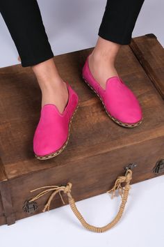 Description Give your style a feminine touch with our bright pink loafers. Entirely handcrafted shoes by Turkish and Yemen craftsmen, following quality traditional techniques. The casual loafers are handmade from genuine and the finest leather and the dyes are completely organic. This vibrant pair comes in a fuchsia pink color and gives any outfit an instant touch of color and a feminine feel. A classic slip-on style with a rounded toe is ready to become your go-to option when it comes to footwe Pink Round Toe Loafers For Summer, Casual Pink Flats With Branded Insole, Spring Pink Leather Shoes With Rubber Sole, Pink Casual Flats With Rubber Sole, Casual Pink Flats With Rubber Sole, Summer Moccasins With Leather Footbed, Pink Flats With Rubber Sole For Spring, Pink Almond Toe Flats With Rubber Sole, Pink Leather Loafers For Summer